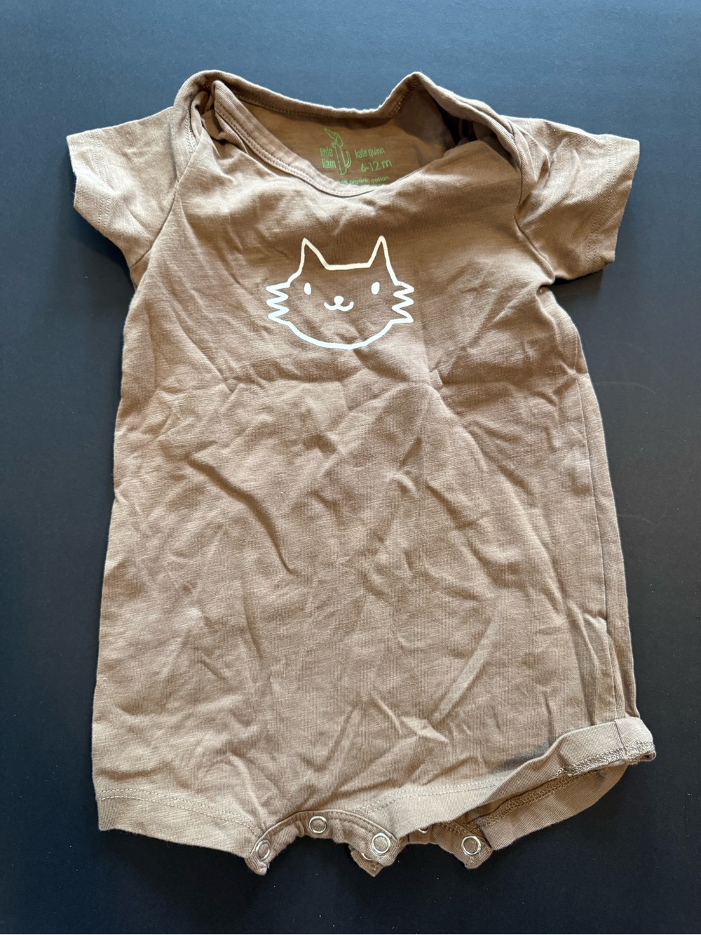 kate quinn Tan Baby Onesie with White Cat Print